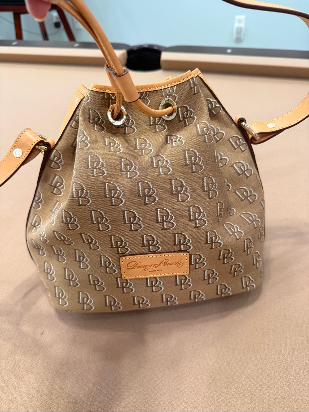 Dooney & Bourke Brown/Tan Logo Drawstring Bucket Shoulder Bag